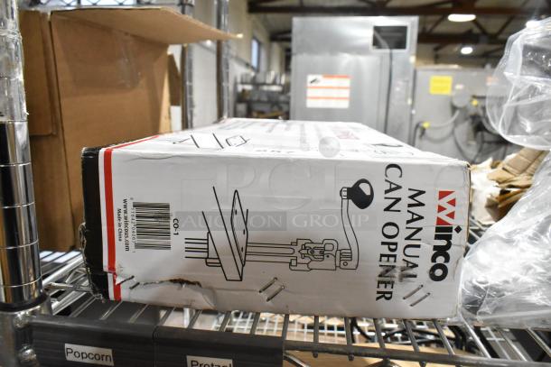 Brand new Winco CO-1 manual can opener for up to size #10, includes base, blade, gear, and installation kit. Box slightly damaged.