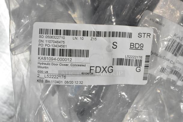 Set of 4 new KAS1094-000012 hydraulic door closers, concealed mount. Packaging shows labels with codes and specifications.