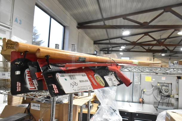 2 brand new Libman 1038 24" floor squeegees with 60" wood handles, in original packaging, tags visible.