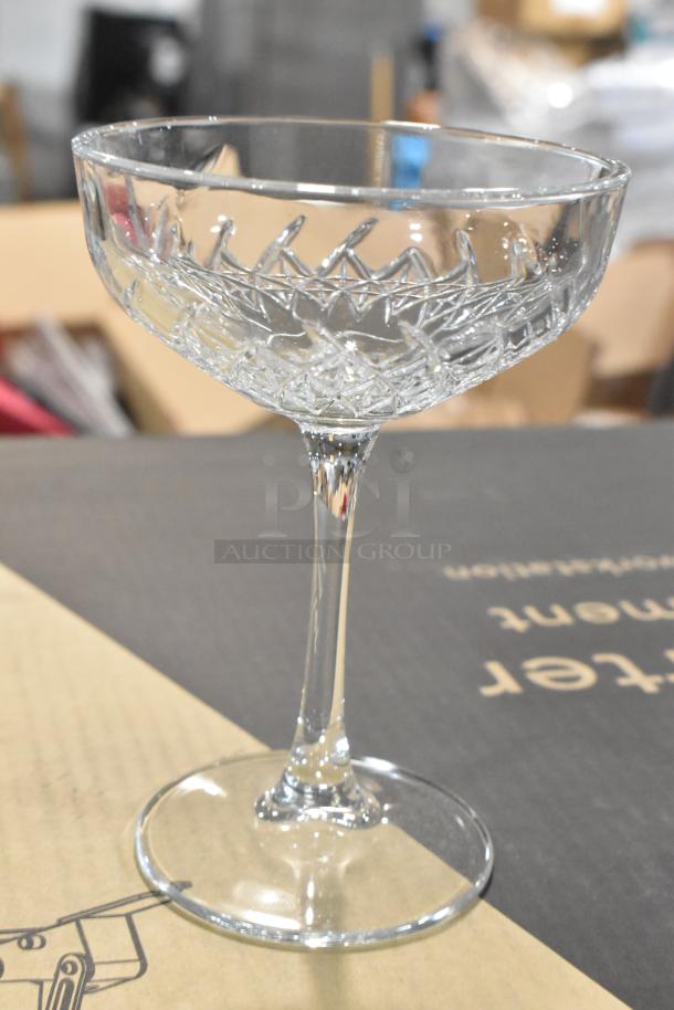 Box of 5 Pasabahce glasses, brand new with scratch and dent. Crystal pattern, elegant design, clear glass.