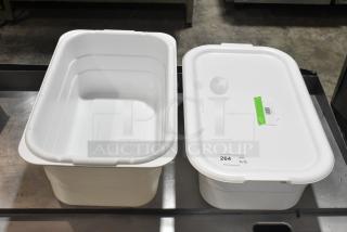 Two new Ayrking HPB303 and HPB325 white plastic lugs, one with a hole. Includes labels and auction markings.