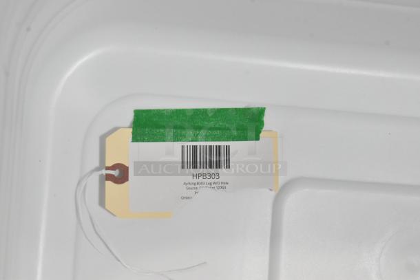 HPB303 Ayrking B303 lug without hole, new condition, with tag labeled "HPB303" and barcode, secured with green tape.