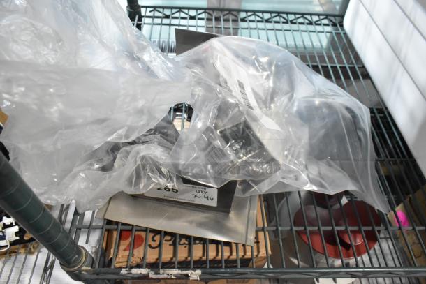 4 brand new, scratch and dent items: AyrKing 12" brush cover, 378PSMM0836 fan motor, Carnival King cam assembly, Garde can opener base.