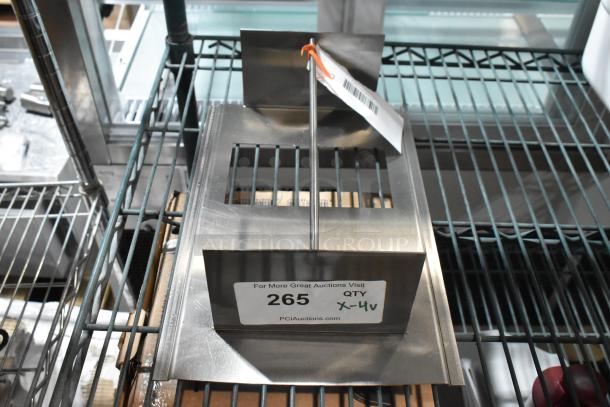 4 brand new scratch and dent items including AyrKing stainless brush cover, fan motor, cam assembly, and can opener base.