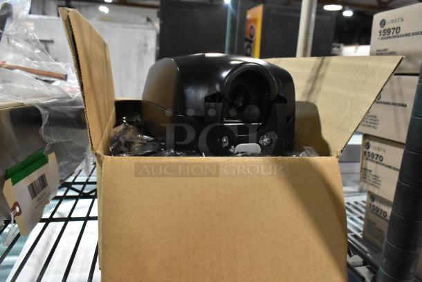 GOJO® 2730-12 TFX 1200 mL Black Touchless Hand Soap Dispenser in an open box. Brand new, minor packaging dent.