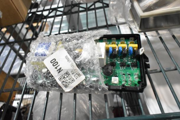 Bubble-wrapped electronic circuit board with QR code, marked "N-100" on label. Appears in new condition.