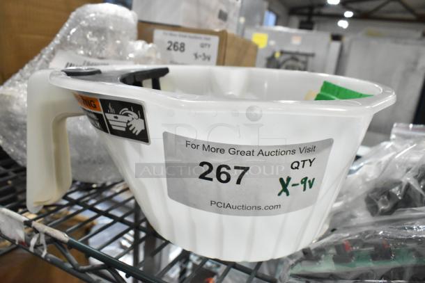 White plastic container with handle, labeled for auction lot 267, placed on a metal shelf.