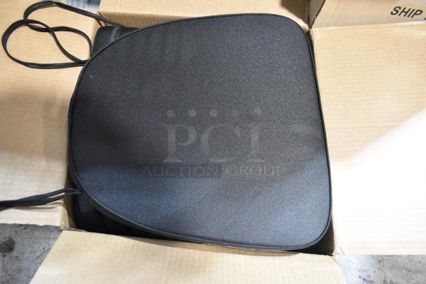 Brand new Lancaster Table & Seating black Chiavari chair cushion with ties, 2" thick, in a box.