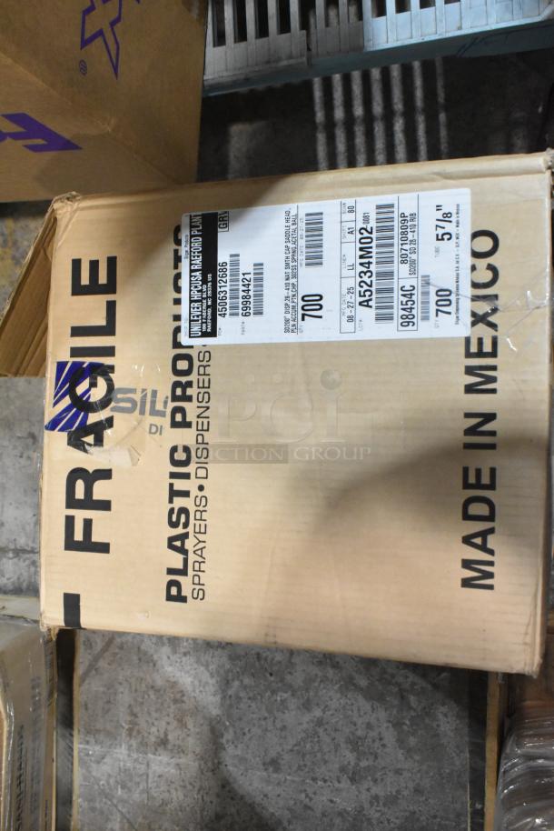 Cardboard box labeled "Fragile" containing brand new Lancaster Chiavari chair cushion, black with ties, 2" thick.