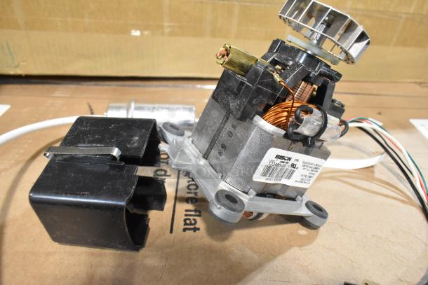 Brand new Vitamix 062467 motor for blenders, model 96562467, with minor scratches and dents, visible label indicates specs.