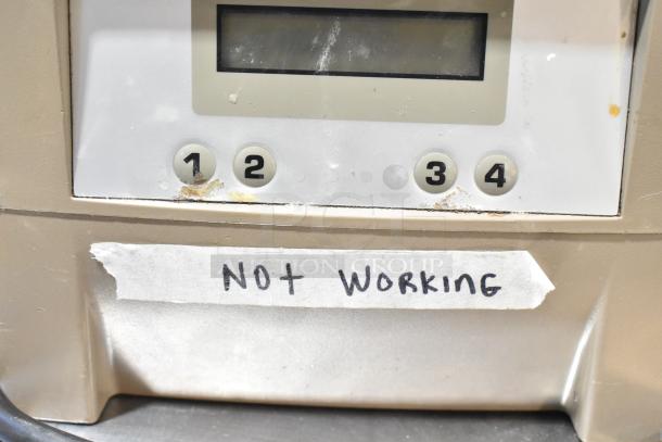 VitaMix VM0145 blender base with label indicating "Not Working"; control panel with buttons 1-4 shown.