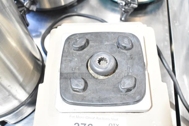 VitaMix VM0145 blender base, used condition, with visible wear. Includes a 3-gallon tank. Auction label states "2 times your bid."