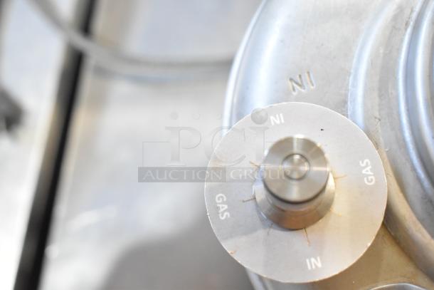 VitaMix VM0145 blender base and 3-gallon tank. Stainless components with "NI" and "GAS" markings visible.