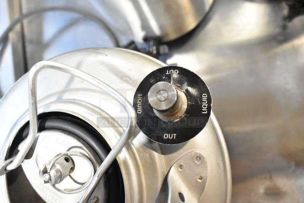 VitaMix VM0145 blender base in used condition with visible controls and 3-gallon stainless steel tank. Liquid out label shown.