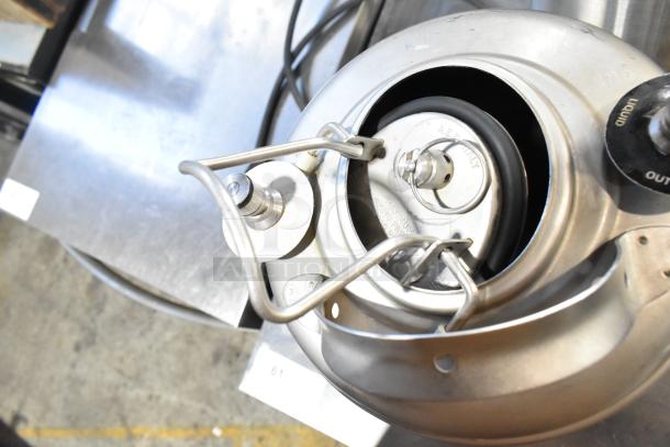 VitaMix VM0145 blender base with metal lid and locking mechanism, part of 3-gallon tank set in good condition.