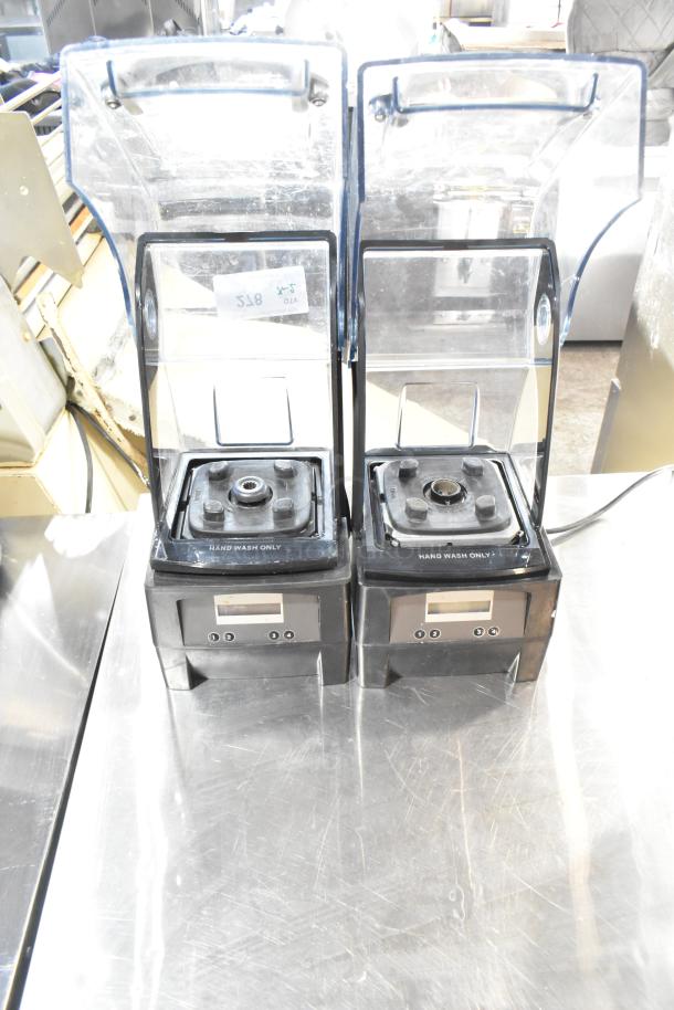 2 VitaMix VM0145 metal countertop blenders with sound enclosures, 120 volts, 1 phase. Clean, used condition, hand wash only label.