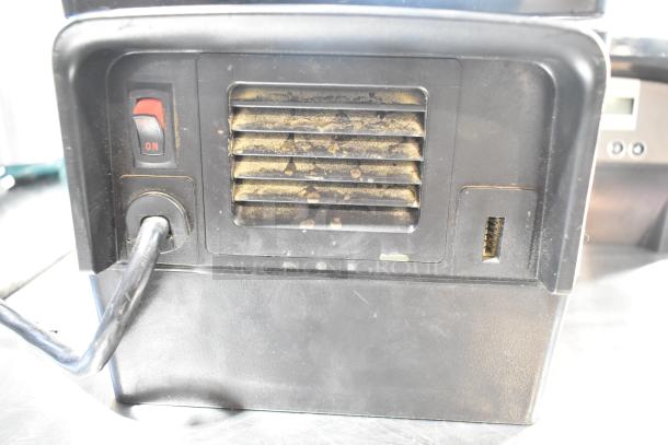 2 VitaMix VM0145 metal countertop blender with sound enclosure, power switch visible, 120 volts, used condition.