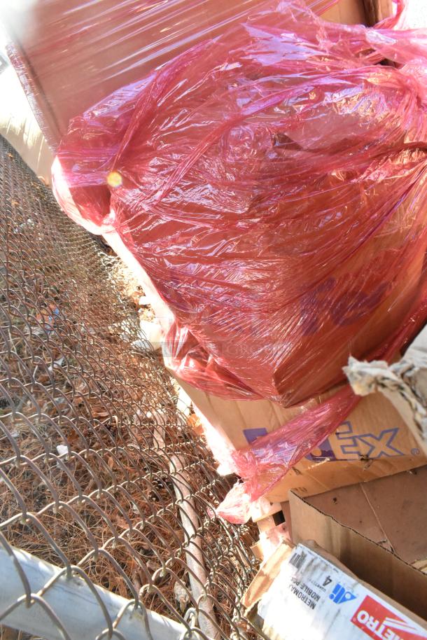 Six brand new items wrapped in red plastic, including BK-MIB-2422 ice bin, GT-8 grease trap, and Rubbermaid caster kit; FedEx box visible.