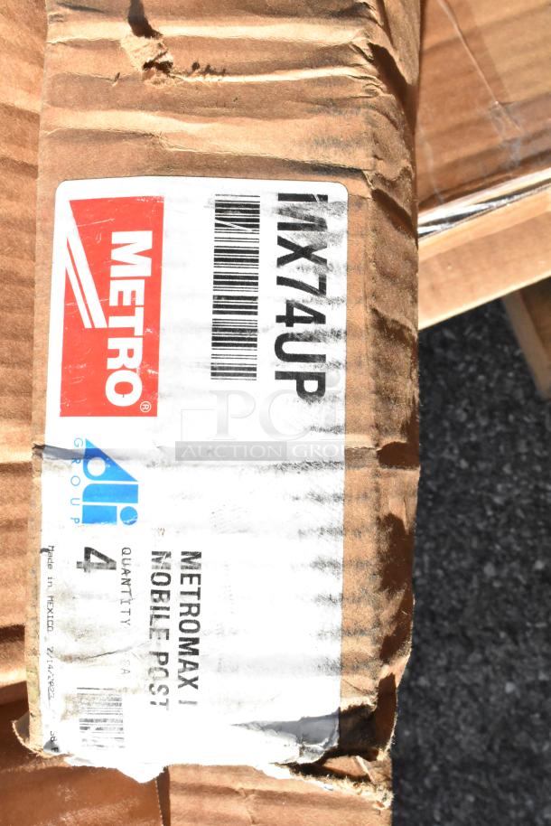 Cardboard box labeled Metro, containing Metromax I mobile post. Box appears worn, but items are brand new.