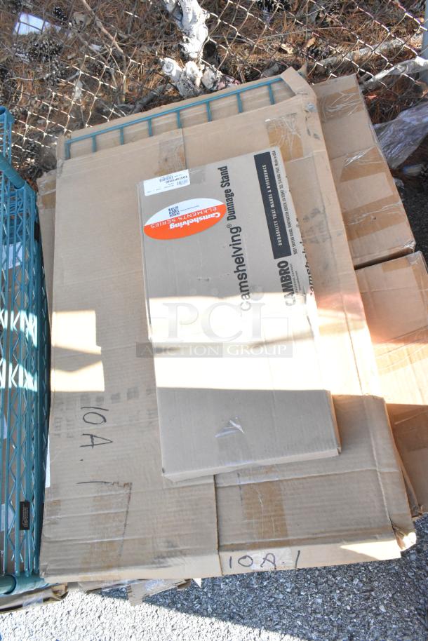 Cardboard box labeled "Camshelving" and "Cambro," containing new items including John Boos PB-SS-208 portable soak sink.