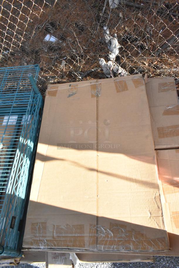 Cardboard box with wire shelves and metro poles, part of a lot including a John Boos PB-SS-208 soak sink in the packaging.
