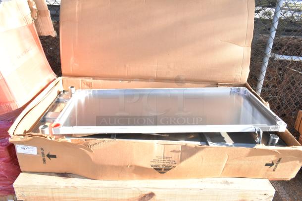 Advance Tabco KMSLAG-305-X stainless steel work table with 5" backsplash and undershelf, new in box.