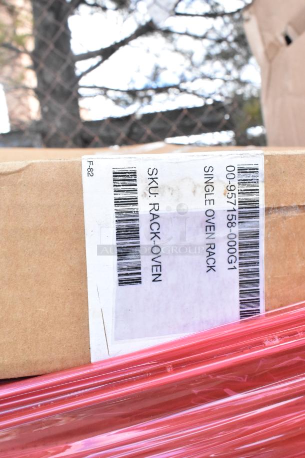 Box with a label indicating "Single Oven Rack" and SKU: RACK-OVEN, sealed with pink wrap, part of 12 new items.