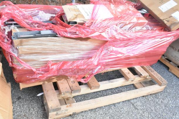 12 new items, including oven rack, Metro SMA24A-ADD shelf arm, Metro 2460DRK3 dunnage shelf, wrapped on a pallet.