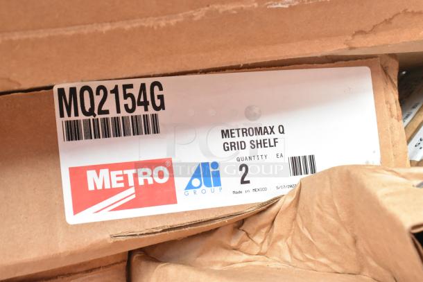 New Metromax Q Grid Shelf MQ2154G in box; features Metro brand label; includes 2 shelves, made in Mexico.