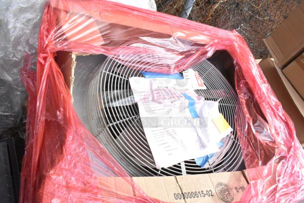 Brand new Manitowoc JCT1200 Vertical Discharge Remote Ice Machine Condenser, 208/230V, in packaging with visible labels.