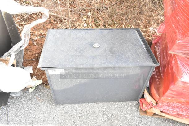 BRAND NEW SCRATCH AND DENT BK Resources BK-GT-10 grease trap, steel, diamond-patterned lid, slight surface imperfections, outdoor placement.
