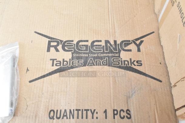 Brown cardboard box labeled "Regency Stainless Steel Commercial Tables and Sinks" with text "Quantity: 1 PCS". Item inside not visible.