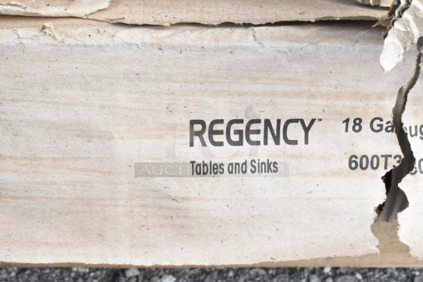 Regency brand packaging showing label "Tables and Sinks," 18 gauge, code 600T3, slightly damaged cardboard.