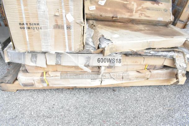11 brand new scratch and dent items, including boxes labeled "Bar Sink 60J812114," "600WS18," on a pallet, showcasing potential minor damage.