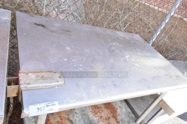 Stainless steel table with metal under shelf, mounted can opener, and visible wear. Edlund label on mount. Item tag: "307, 1X."