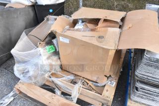 Three brand new scratch and dent outdoor table base columns, model 427TBCLRD337, in damaged boxes on a pallet.