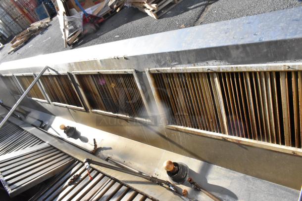 14.5' stainless steel return air grease hood with filters and lights, used, showing wear, suitable for commercial kitchens.