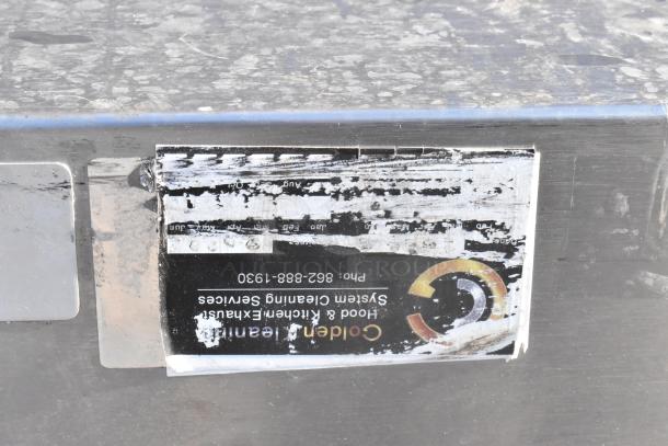 14.5' stainless steel return air grease hood, includes filters and lights. Visible label for Golden Cleaning System Services.