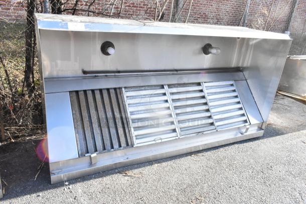 8' stainless steel grease hood with filters and lights, used condition, slight rust on filters, outdoor location.
