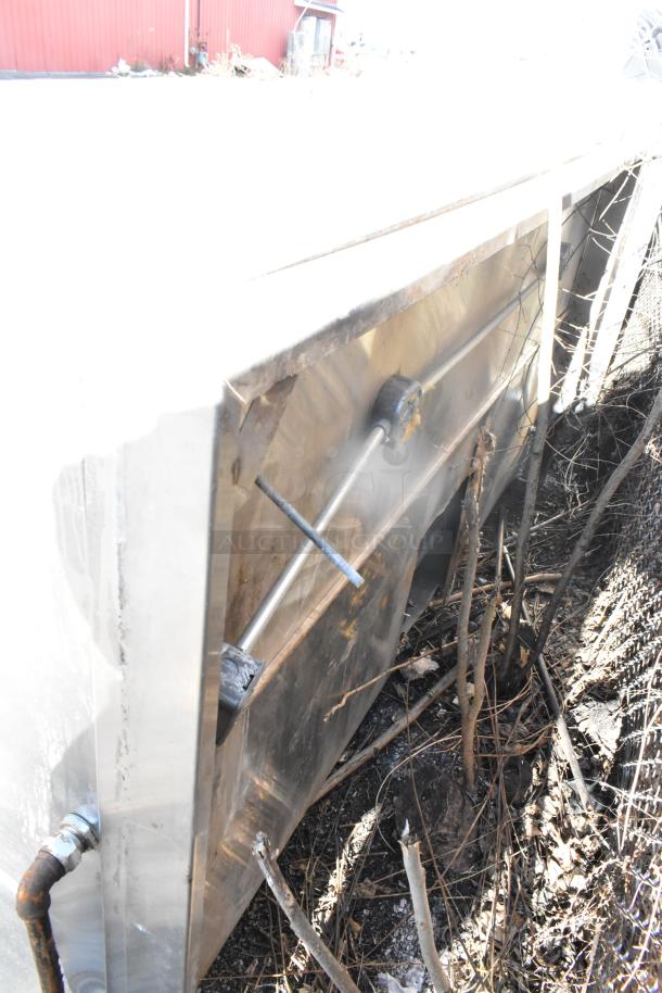 8' stainless steel grease hood with filters and lights. Slightly weathered; suitable for commercial kitchen use.