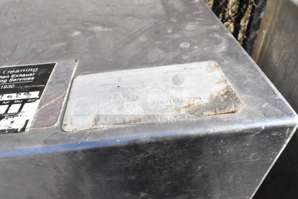 9.5' stainless steel return air grease hood with filters and lights, features manufacturer labels, used condition.