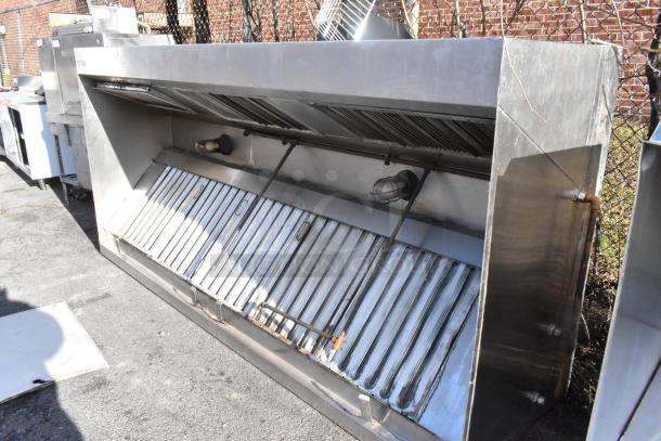 9.5' stainless steel return air grease hood with filters and lights, used; ideal for commercial kitchens.