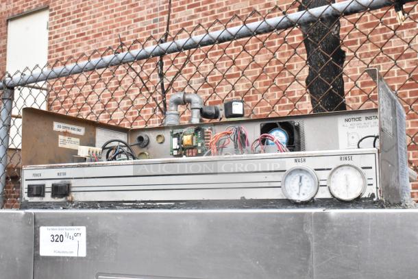 Hobart C44A stainless steel conveyor dishwasher, 480V, 3-phase. Visible wear. Includes control panel, gauges, wiring.