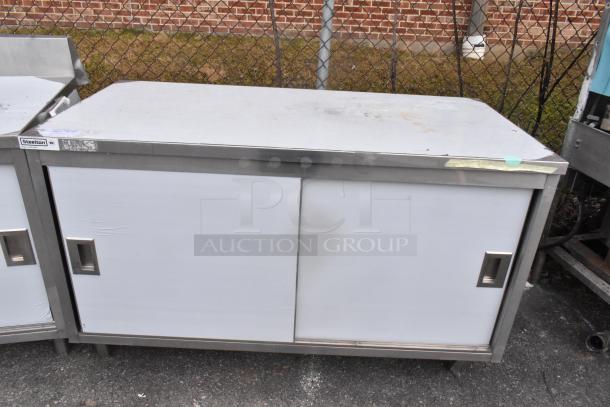BRAND NEW SCRATCH AND DENT Steelton 522EBT3060D 30" x 60" 18 Gauge 430 Stainless Steel Work Table with undershelf and doors.