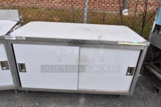 BRAND NEW SCRATCH AND DENT Steelton 522EBT3060D 30" x 60" 18 Gauge 430 Stainless Steel Work Table with undershelf and doors.