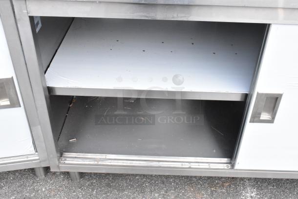 BRAND NEW Steelton 522EBT3060D work table, 30"x60", 18 gauge 430 stainless steel, undershelf, doors, minor scratches.