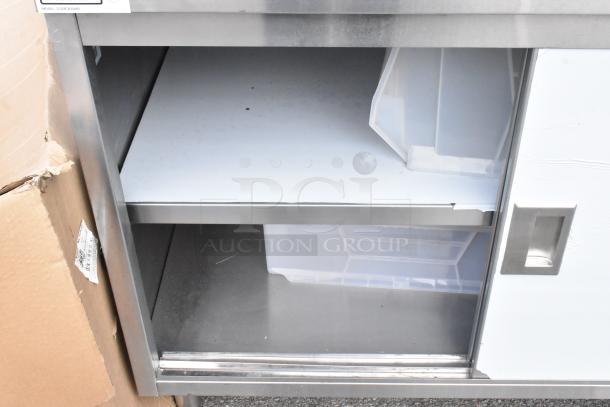 BRAND NEW Steelton 522EBT3048D stainless steel work table, 30" x 48", 18 gauge 430, with undershelf and doors, minor scratches.