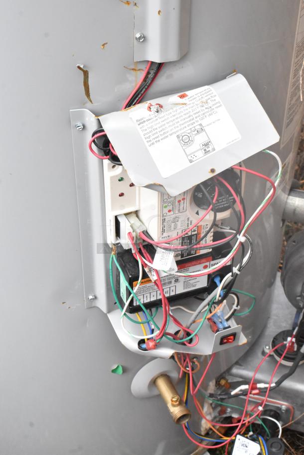 2024 AO Smith BTL-199 water heater, visible wiring and controls, natural gas powered, automatic storage type, detailed labels.