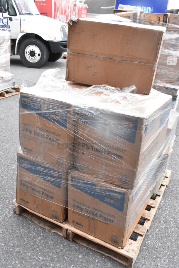 Pallet of Lavex 2-Ply toilet paper boxes, wrapped in plastic. Some boxes show minor wear and tear.