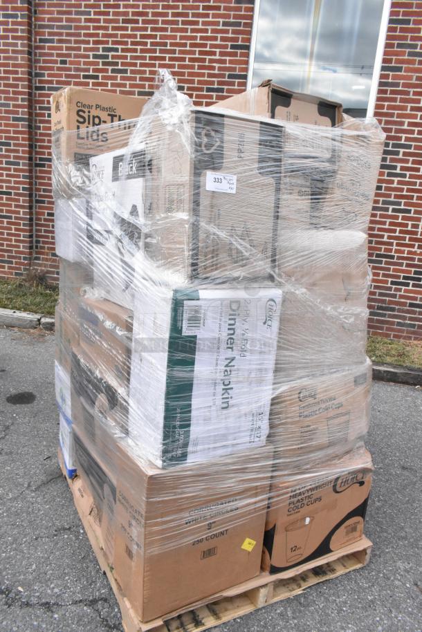 Plastic-wrapped pallet with boxes marked for items like plastic cups, cake circles, and dinner napkins, labeled "BRAND NEW SCRATCH AND DENT."